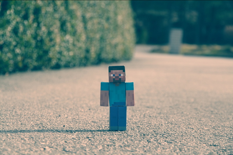 tree, sunlight, Minecraft, cross, nature, human representation, no people, plant, selective focus, surface level, day, outdoors, toy, land, creativity