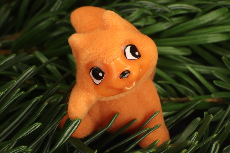 food and drink, representation, grass, plant, nest, animal, squirrel, green, celebration, needles, rodent, male likeness, sitting, toys, fir tree, animal world