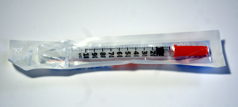 single object, care, insulin, sugar, social issues, level, close-up, container, testing, transparent, injecting, sharp, test, studio shot, medicine, indoors