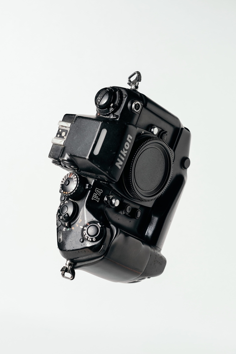 nikon, white background, analog, high angle view, still life, black color, technology, whit, digital camera, 4K, nostalgia, slr camera, studio shot, photographic equipment