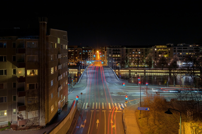 illuminated, built structure, skyscraper, office building exterior, city life, traffic, architecture, bridge, city, dusk, turku, outdoors, no people, high angle view