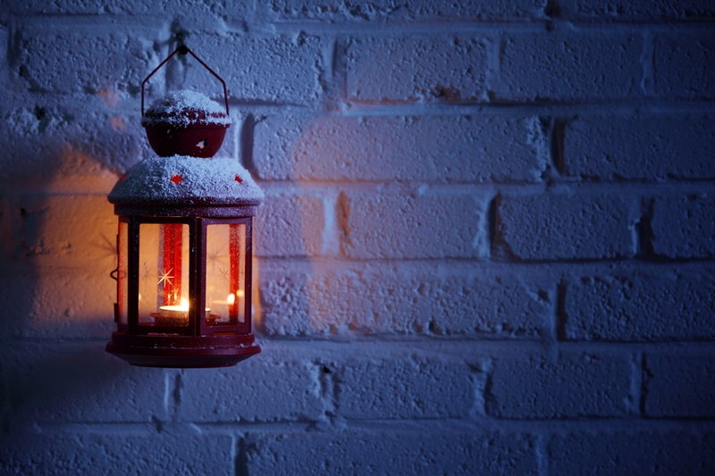 illuminated, architecture, no people, candle, brown, outdoors, electric lamp, light, brick, glass - material, snow, lantern, tea light, red, winter, fire - natural phenomenon