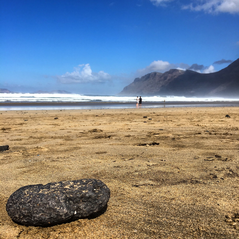 tourism, sea, beach, horizon over water, volcano, volcanic, solid, surfer, water, nature, beauty in nature, sand, famara, mountain, blue, sky, canary, scenery
