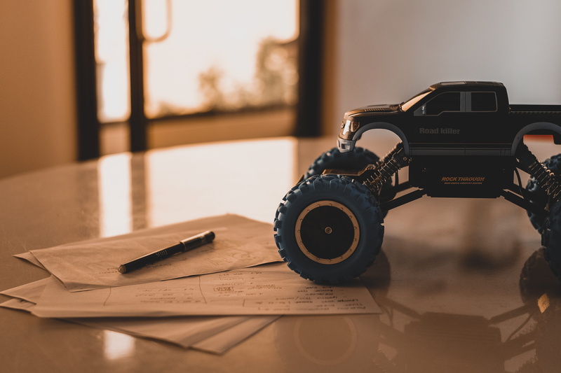 indoors, wood - material, vehicle, truck, photography themes, day, blue, table, technology, equipment, focus on foreground, camera - photographic equipment