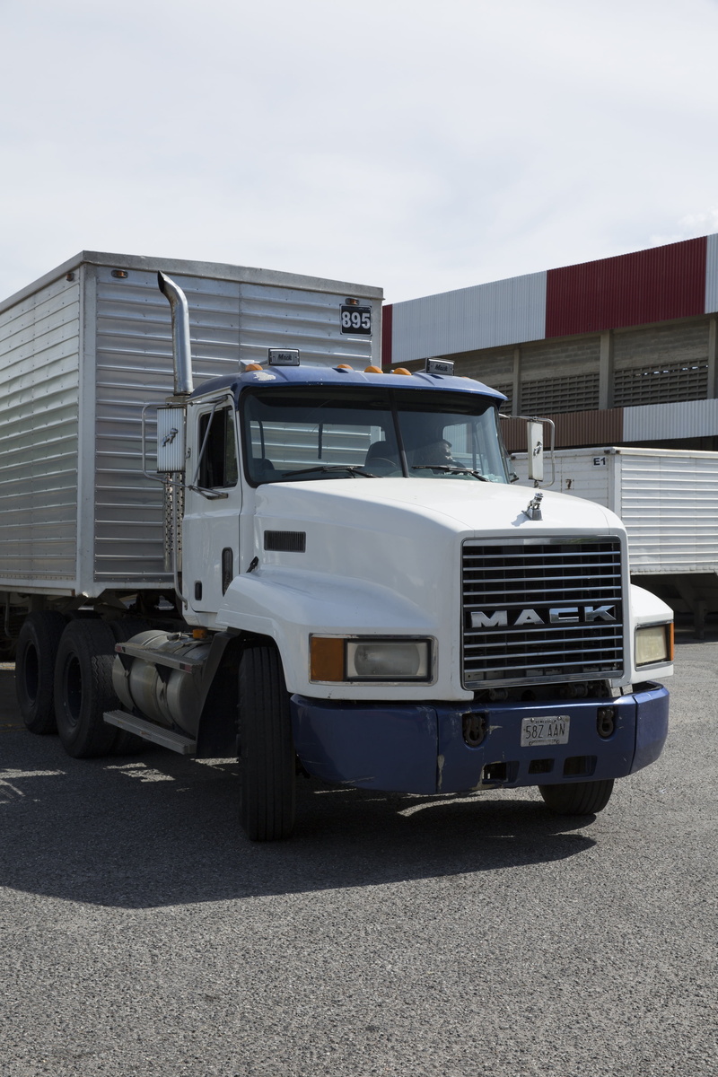 tire, diesel, road, mode of transportation, day, heavy, semi-truck, equipment, mack, truck, industrial, car, design, automobile, wheel, trailer, cargo