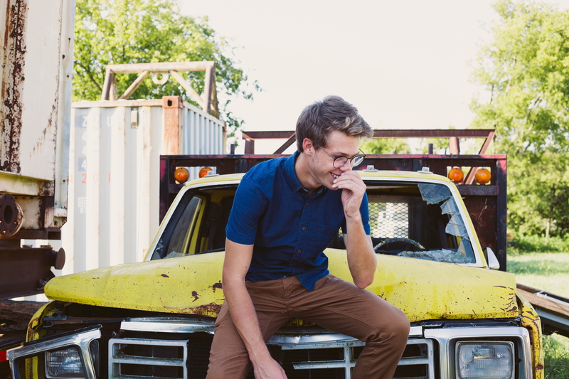 looking, sitting, adult, mode of transportation, day, outdoors, james dean, males, one person, united states, three quarter length, transportation, casual clothing