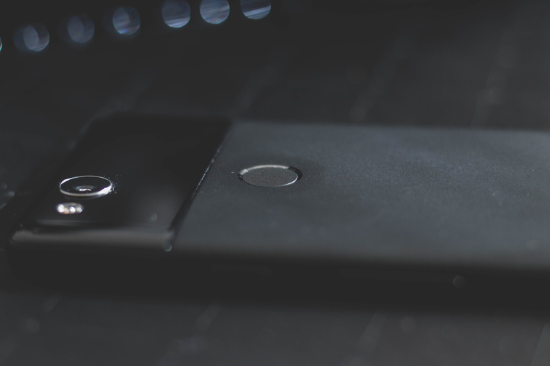 table, equipment, reflection, google pixel, selective focus, water, phone, music, pixel, dark, black color, still life, geometric shape, mobile phone, arts culture and entertainment