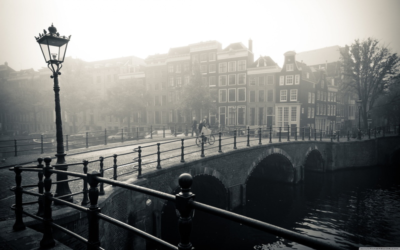 box, city, saddle, metal, railing, day, building, building exterior, street light, bridge, mist, street, truck, mode of transportation, black, built structure