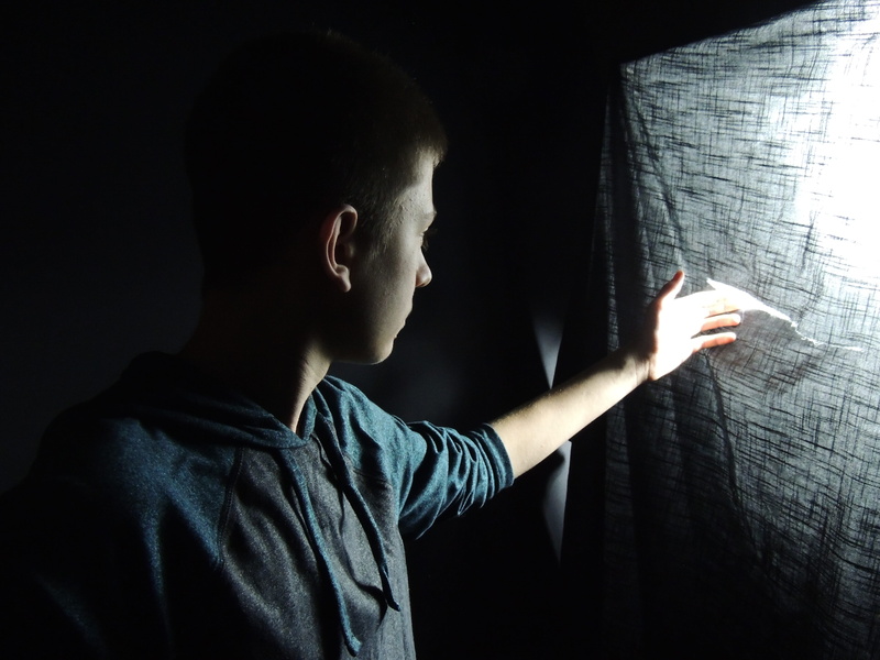window, clothing, learning, boy, wearing, dark, portrait, profile view, light - natural phenomenon, side view, shadow, behind, adult, face, men, room, mid adult