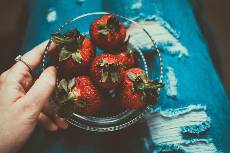 ring, healthy eating, strawberries, finger, table, hand, ripe, focus on foreground, freshness, torn, holding, woman, food and drink, food, one person, human hand