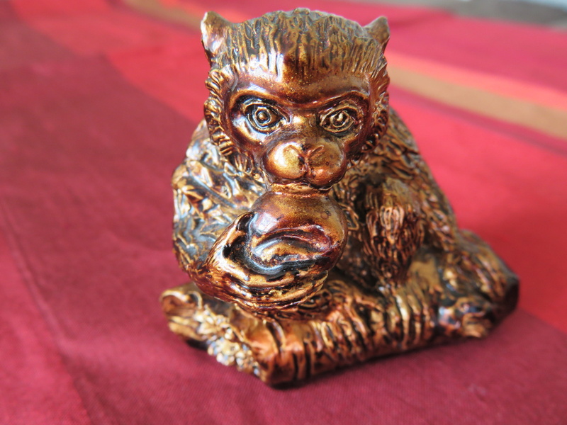 indoors, close-up, 2016, ornate, monkey, gold, one animal, creativity, jewelry, new year, luck, human representation, belief, sculpture, no people, chinese new year