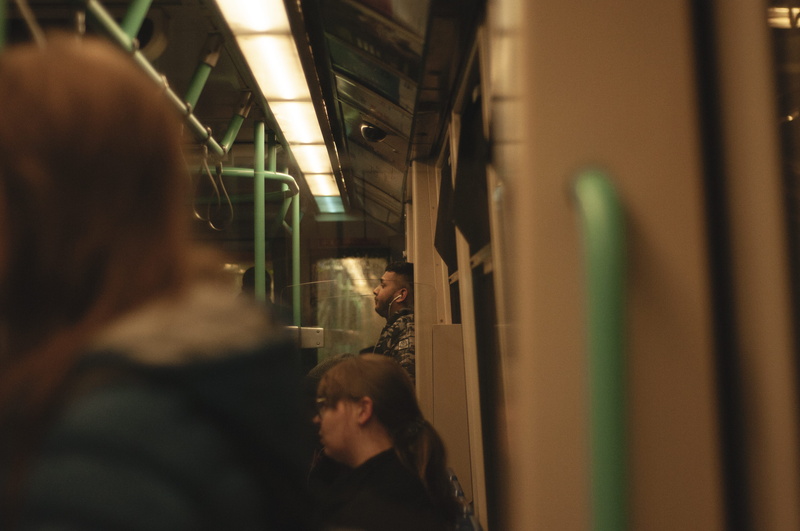 united kingdom, men, commute, london, lifestyles, vehicle interior, rail transportation, adult, group of people, train, subway train, people, selective focus