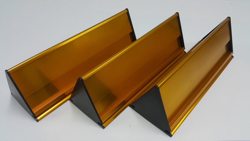 studio shot, yellow, gloss, book, in a row, close-up, ingot, shiny, white background, gold belong, still life, publication, triangle, group of objects