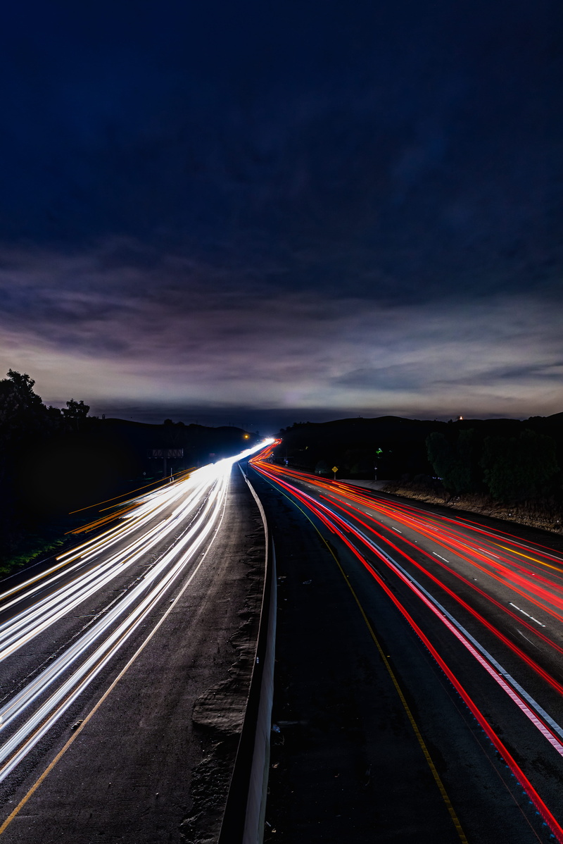 red, 5K, illuminated, photo, traffic, landscape, multiple lane highway, speed, dark, no people, blurred motion, highway, roadway, sky, motion, transportation