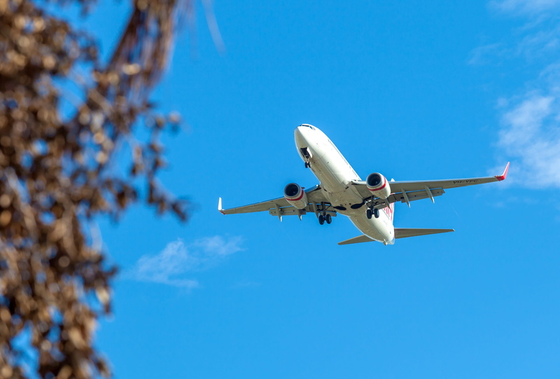 clear sky, copy space, plane, passenger, day, low angle view, white, townsville airport, mode of transportation, mid-air, nature, aerospace industry, jetliner