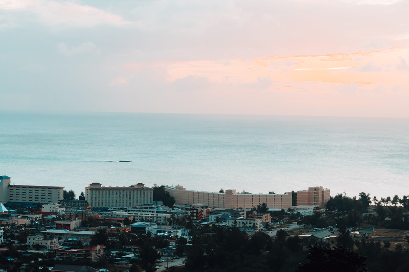 sea, outdoors, city, nature, sky, built structure, 5K, beauty in nature, horizon, beach, northern mariana islands, exotic, no people, saipan, day, cityscape