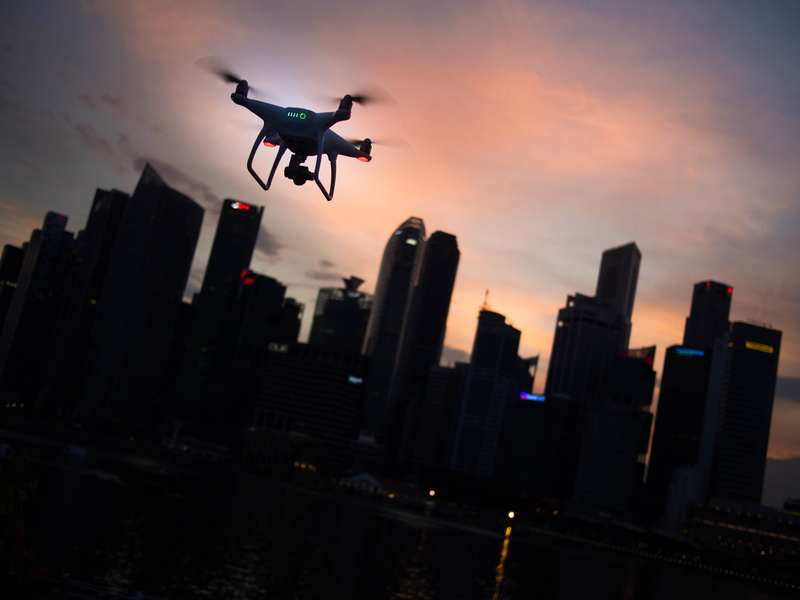 flying, sky, dusk, helicopter, buildings, golden, white, financial district, airplane, air Vehicle, drone, hour, building exterior, technology, landscape