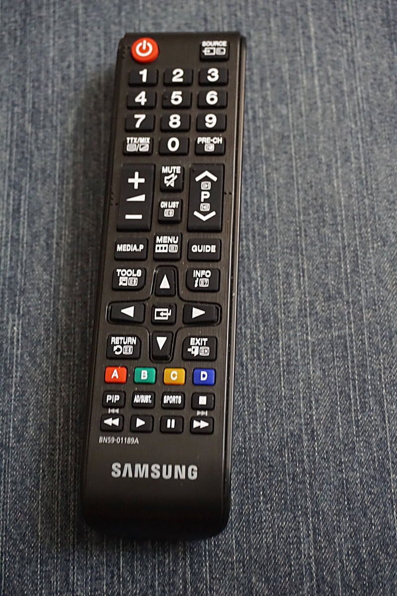 western script, directly above, jeans, wireless technology, text, push button, number, connection, keypad, high angle view, close-up, control, technology