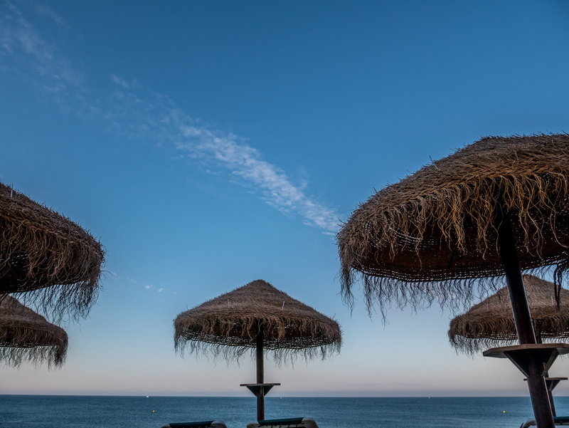 nature, tranquility, lagos, beauty in nature, roof, beach, parasol, blue, sky, coast, cliff, vacations, portugal, landscape, scenics - nature, water, thatched roof