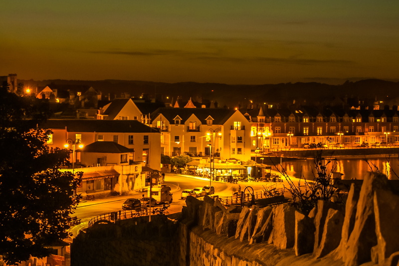 nature, sunset, light, town, built structure, outdoors, city, cityscape, night, water, townscape, high angle view, famous Place, house, cloud - sky, building exterior