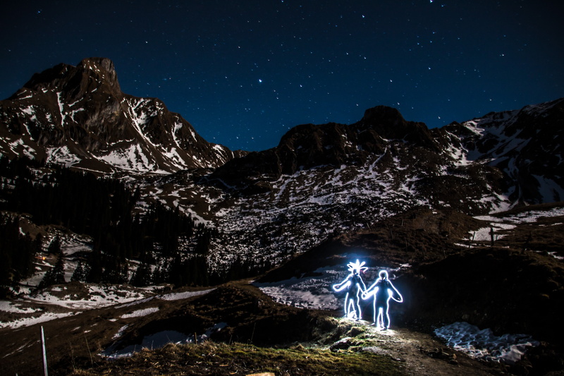 real people, shooting star, snow, light graffiti, men, light, astronomy, mountain, alps, switzerland, one person, illuminated, cold temperature, night sky