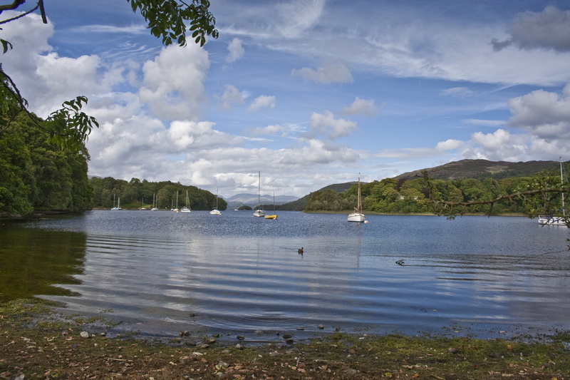 water, sky, land, lake district national park, beauty in nature, nautical vessel, tree, cloud - sky, lake, boats, plant, non-urban scene, no people, tranquility