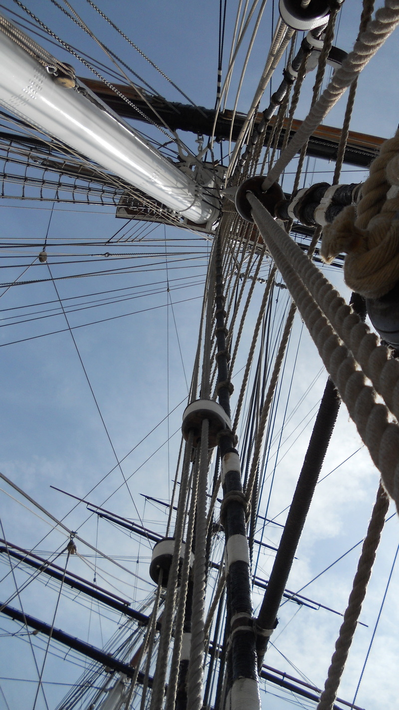 mode of transportation, rope, rigging, pole, cutty sark, real people, history, one person, mast, transport, sky, water, travel, nature, sailing, lifestyles