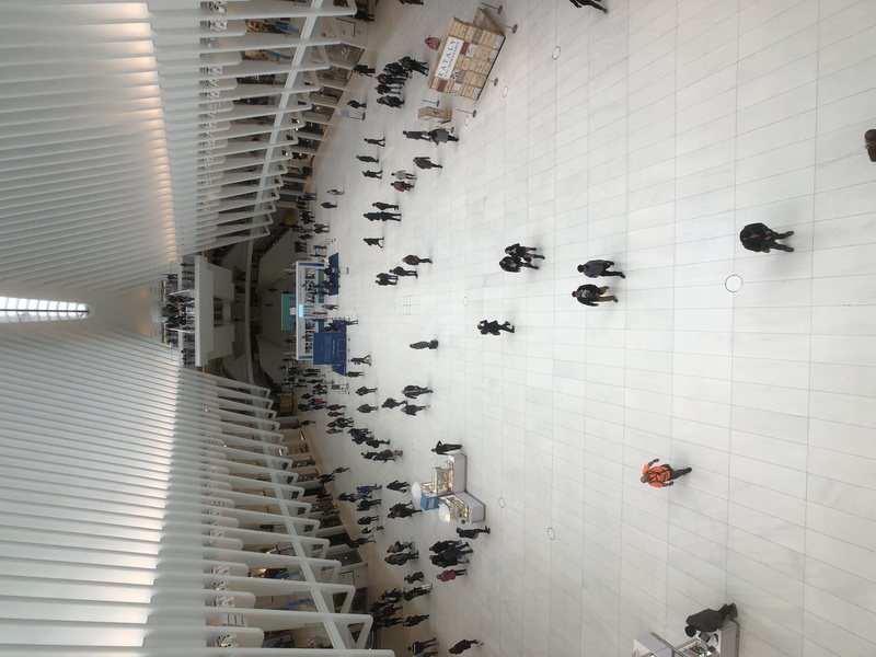 new york, indoors, day, directly above, no people, city, lobby, building, inside, crowd, ceiling, terminal, built structure, flooring, stadium, convention center