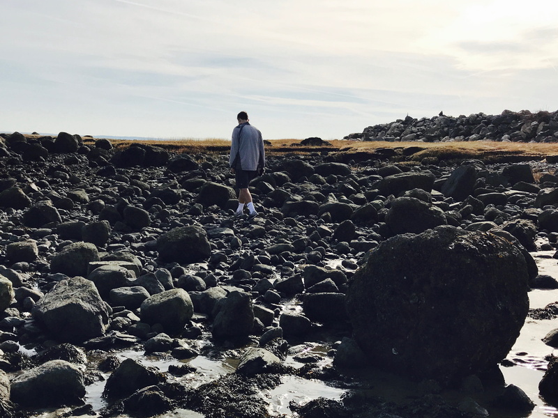 rock - object, rocks, rear view, leisure activity, wandering, full length, sea, scenics - nature, man, standing, gray, greenwich, nature, sky, united states