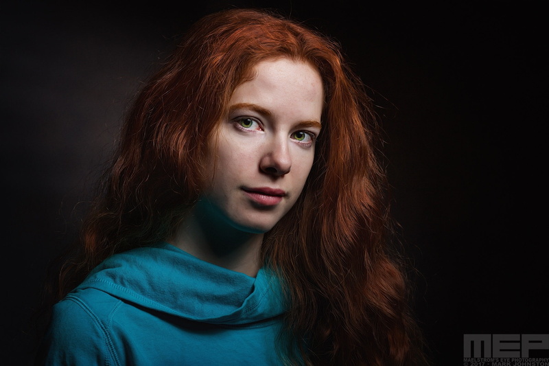 contemplation, The Maelstroms Eye, portrait, studio shot, adult, one person, dyed red hair, headshot, redhead, indoors, beauty, hair, face, green eyes