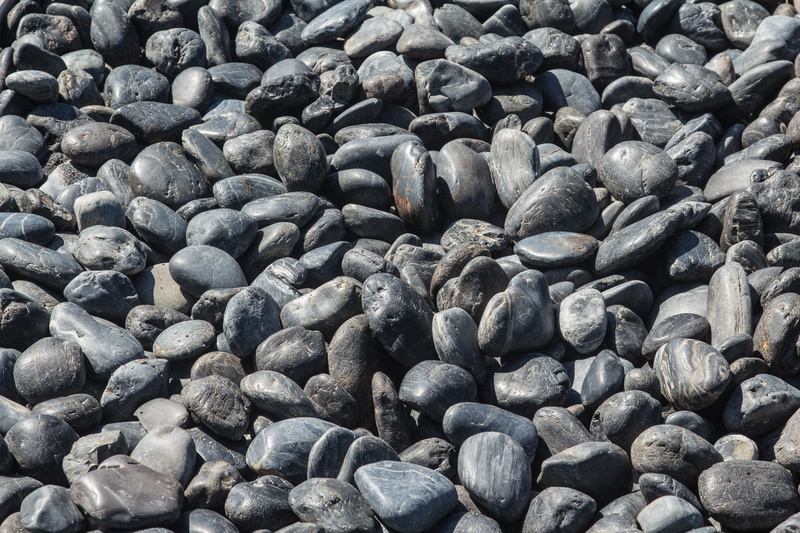 large group of objects, sunlight, backgrounds, high angle view, abundance, nature, stone, heap, textured, rock - object, pebble, stones, rock, background