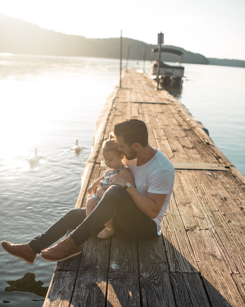 two people, lifestyles, ducks, lake, young men, boat, brown, white, nature, pier, outdoors, wood - material, adult, full length, daytime, men, women, positive emotion