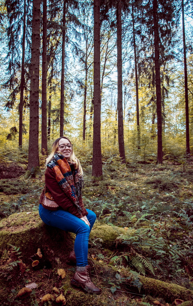 natural, acid, one person, brown, glasses, warm clothing, women, outdoors, day, full length, color, tree, real people, nature, forest, tree trunk, blond