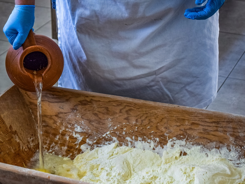 food and drink, food, water, human body part, pouring, hands, preparing food, adult, one person, knead, traditional, jug, indoors, trough, freshness, flour
