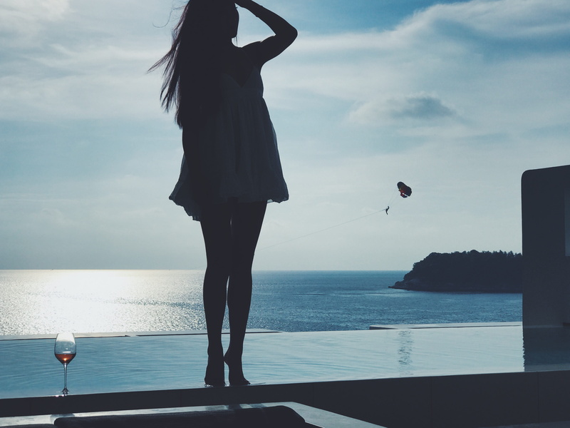 leisure activity, kata rocks resort and residences, beauty in nature, standing, horizon, swimming pool, cloud - sky, beach, women, one person, nature, kata