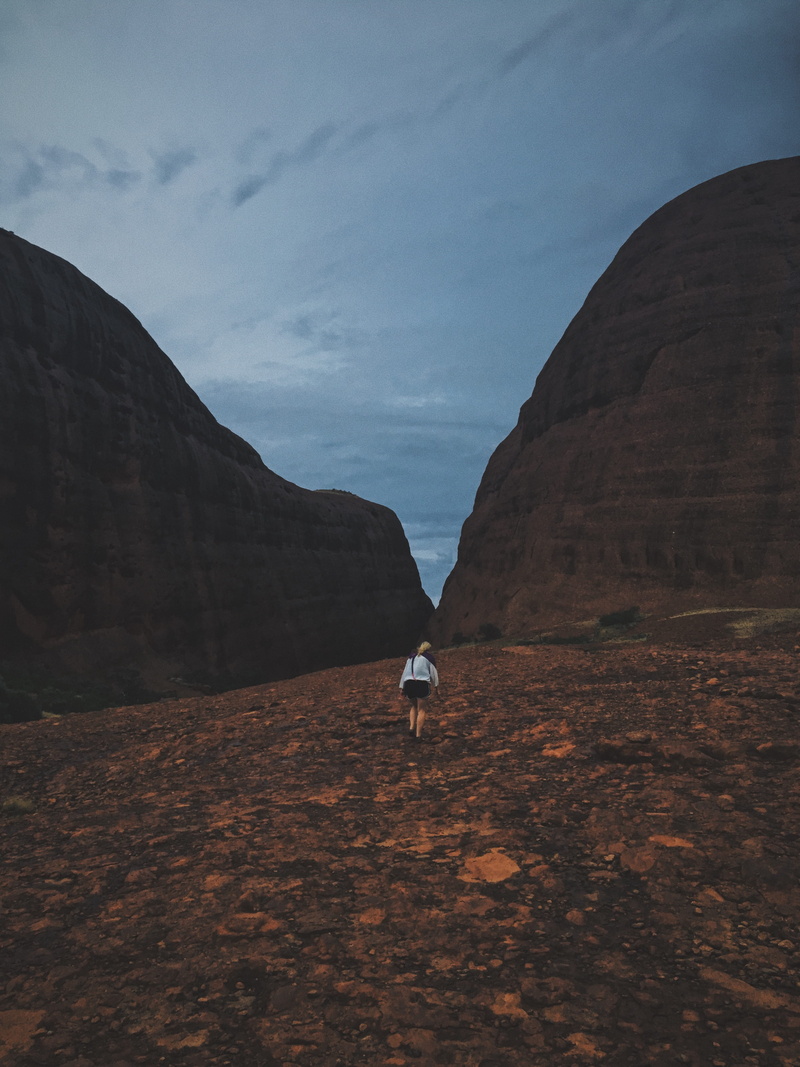beauty in nature, petermann, tranquility, rear view, olga, mountains, nature, dark, canyon, isolated, real people, atmospheric, kata tjuta, sky, day, outdoors