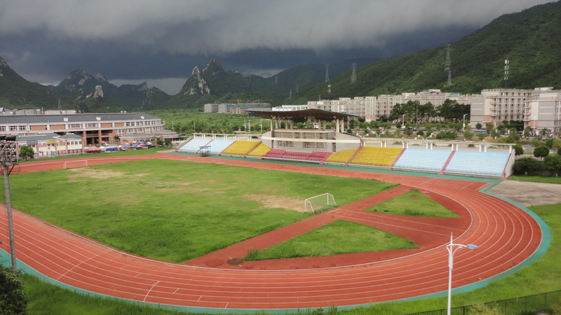 sports track, plant, day, building exterior, field, 4K, Campus, city, built structure, outdoors, cloud - sky, architecture, high angle view, no people