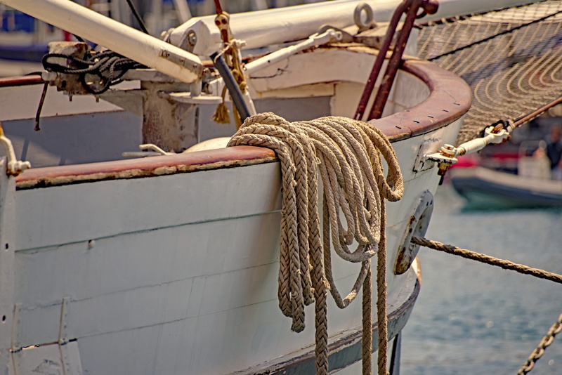 fishing boat, nautical vessel, day, fishing, moored, hanging, water, tied up, rigging, marine, sea, mooring, vessel, sailboat, outdoors, boat, port, mode of transportation