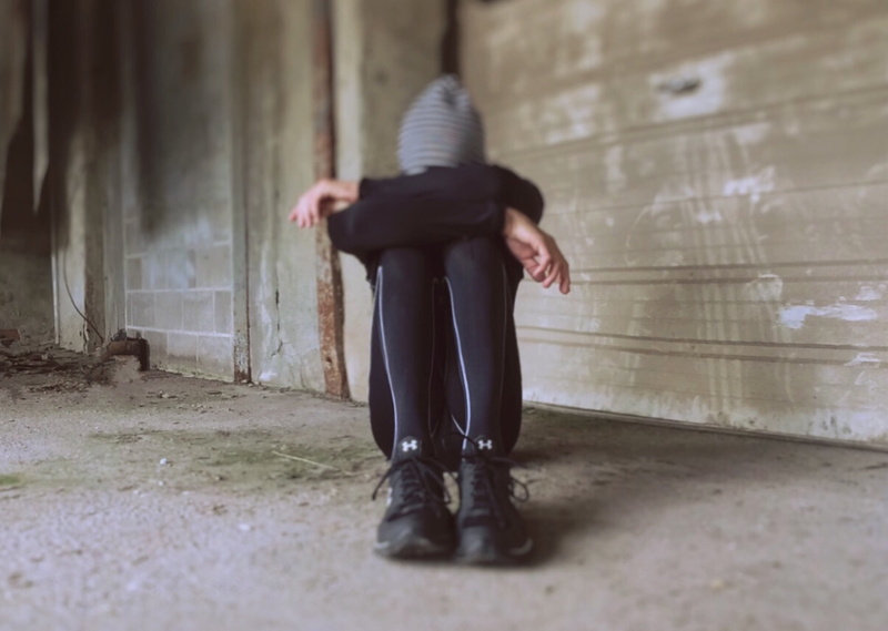 lost, sadness, indoors, urban, lifestyles, full length, tracksuit, afraid, women, flooring, lying, ground, people, person, day, one Person, solitude, standing
