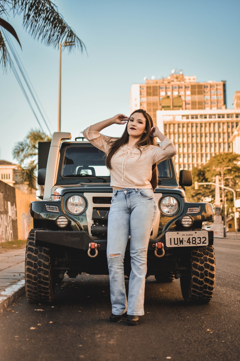 land vehicle, porto alegre, building exterior, architecture, motor vehicle, beautiful woman, brazil, adult, day, car, mode of transportation, full length