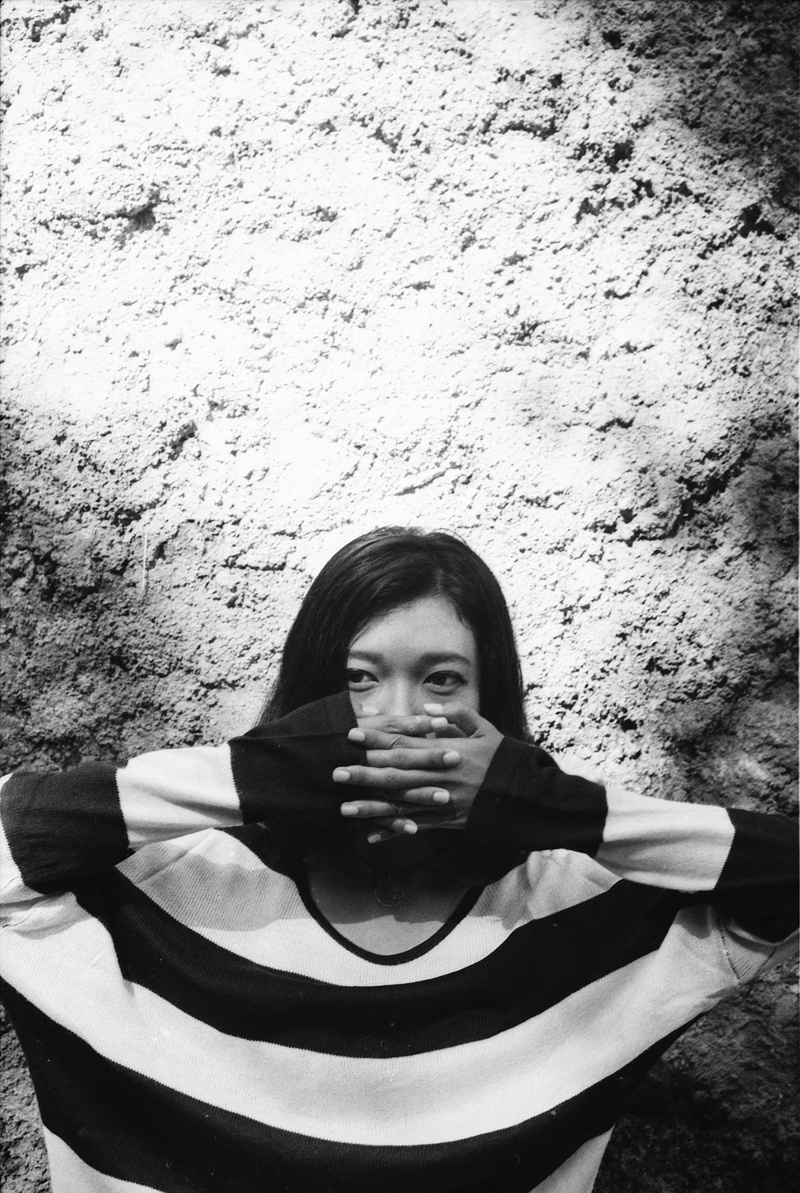 wall - building feature, portrait, fashion, beautiful woman, canon ft/ql, leisure activity, day, lifestyles, headshot, females, indonesia, standing, front view
