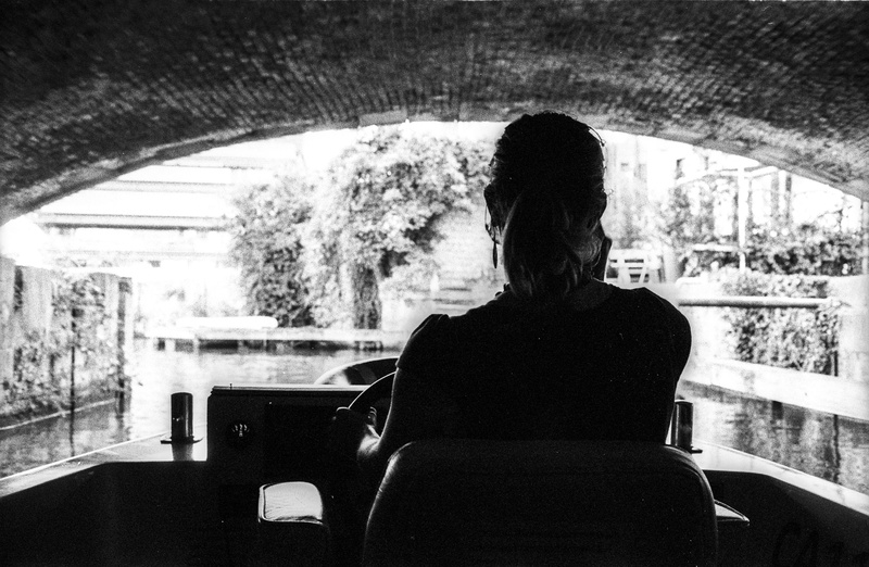 river, real people, tunnel, waist up, lifestyles, electro, adult, belgium, ilford, gent, travel, indoors, sitting, architecture, boat, monochrome, day