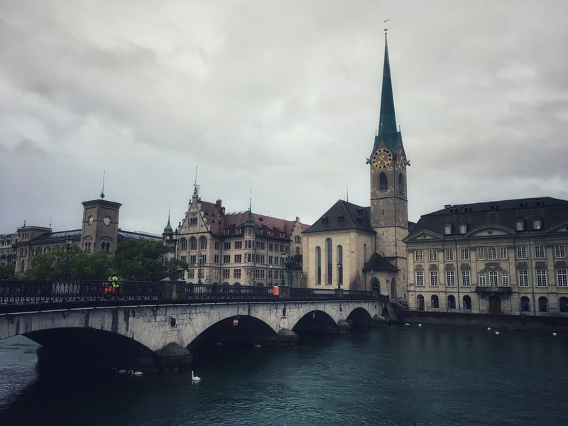 outdoors, water, built structure, no people, waterfront, arch bridge, spire, travel, arch, zurich, kirche, cloud - sky, nature, sky, switzerland, architecture