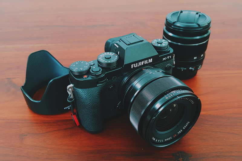 lens - optical instrument, close-up, home video camera, digital single-lens reflex camera, technology, photographic equipment, table, camera, high angle view