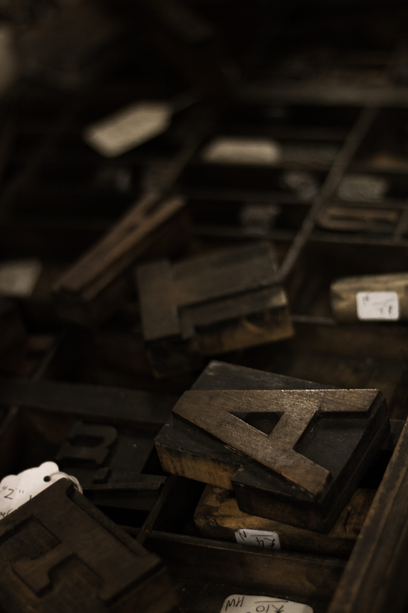 focus on foreground, old, close-up, print, craftsmanship, letters, design, abandoned, vintage, equipment, still life, indoors, typography, woodwork, obsolete
