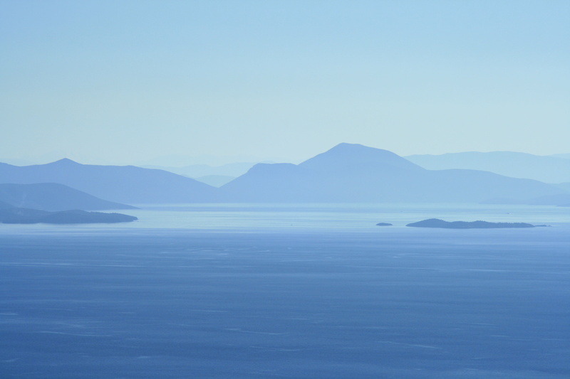 outdoors, near, blue, vacation, day, coastline, body, non-urban scene, islands, travel, waterfront, 4K, salt flat, mountain peak, distant, misty, beauty in nature