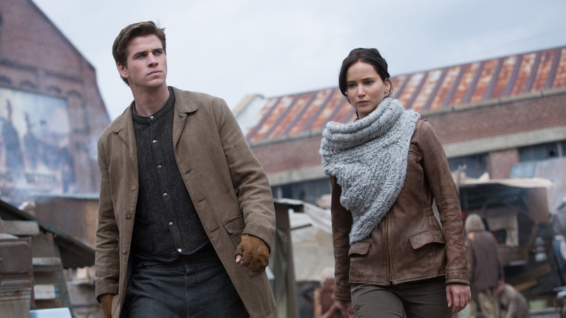 day, clothing, couple - relationship, young men, people, architecture, city, Movies, men, waist up, standing, adult, two people, jacket, the hunger games: catching fire