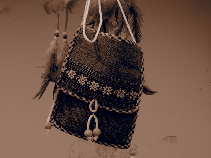 old-fashioned, purse, hairstyle, white, clothing, hanging, hanged, portrait, one person, back, pattern, 4K, rope, jacket, handbag, indoors, brown, day