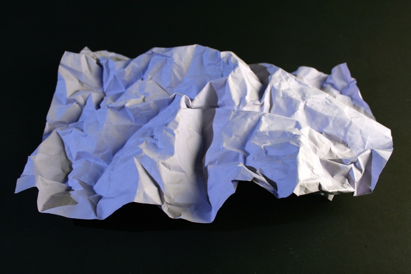 black, copy space, cut out, studio shot, white, high angle view, close-up, background, negative emotion, crumpled paper ball, frustration, black background