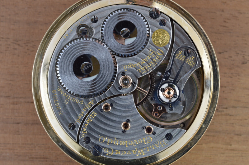 indoors, machine Part, pocketwatch, metal, silver colored, shape, instrument of time, equipment, technology, old-fashioned, wheel, no people, mechanism
